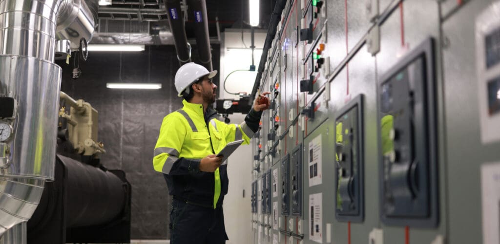 An HVAC controls engineer working on a control system